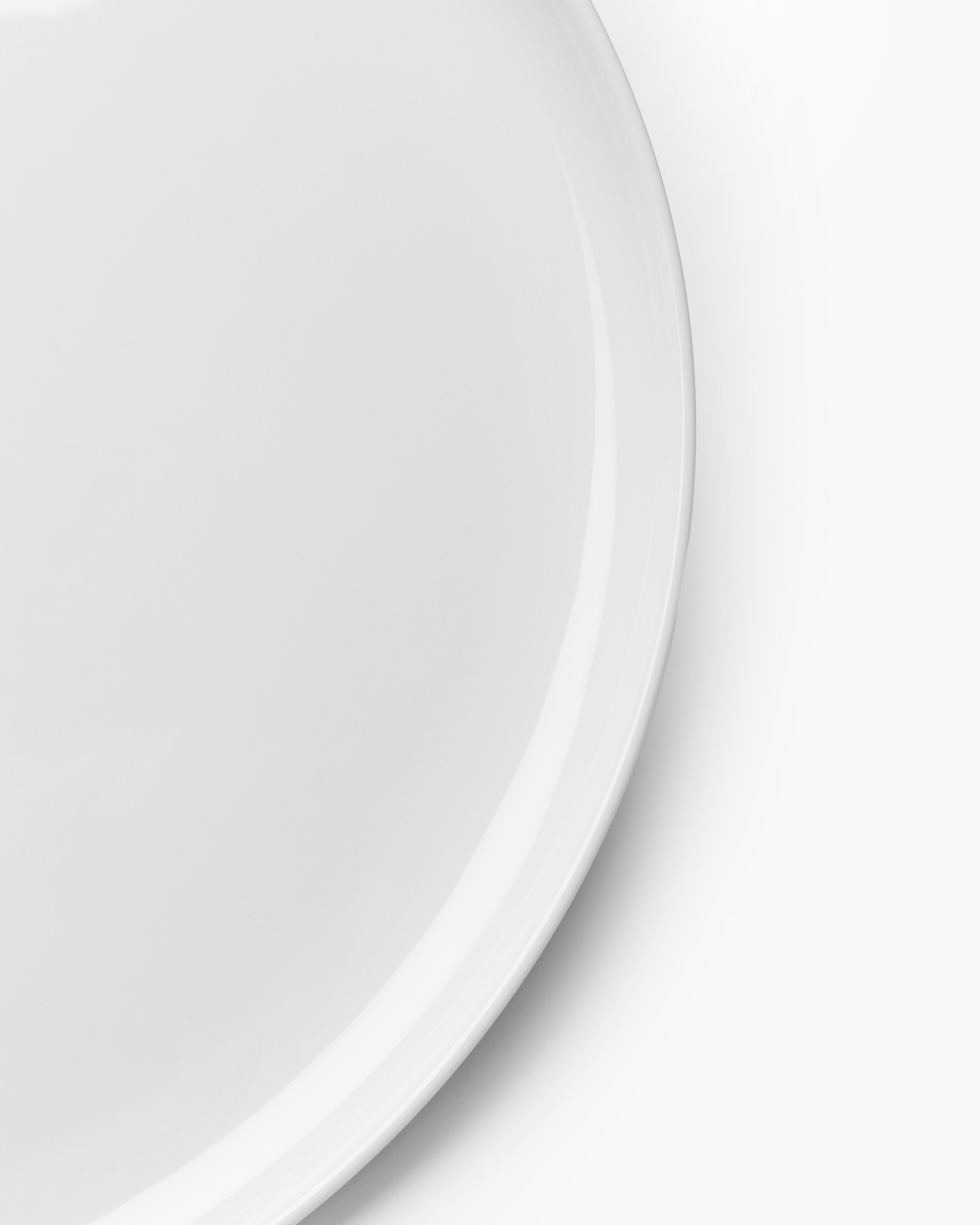 Serax Base předkrmový talíř bílý nízký kostní porcelán
